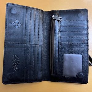 Beautiful barely used Patricia Nash black leather wallet. Excellent condition!